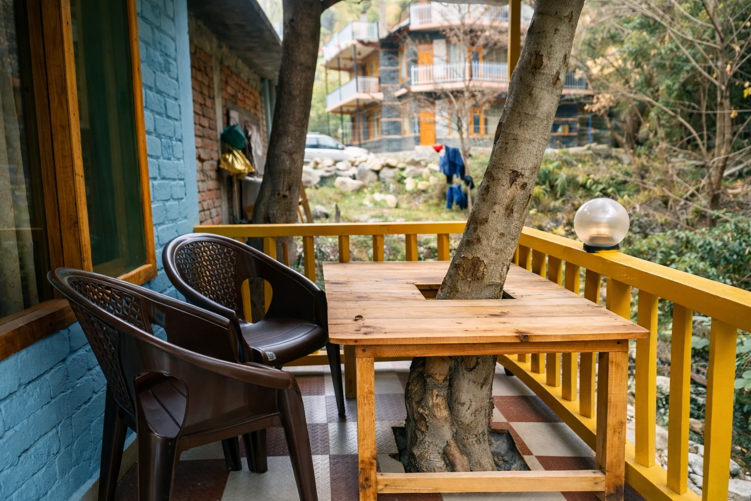 Balcony view surrounded by nature at The River Haven Homestay, Tirthan Valley