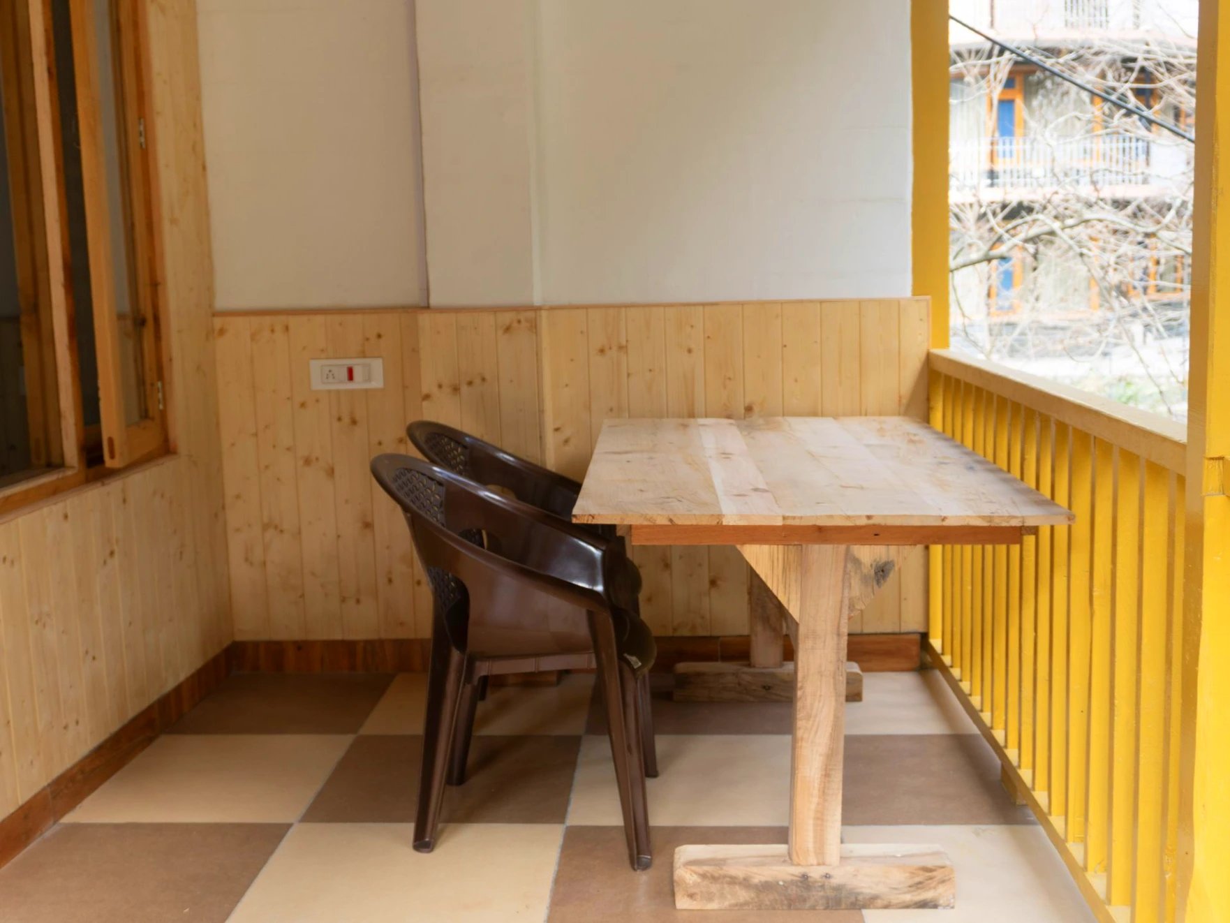 Balcony view surrounded by nature at The River Haven Homestay, Tirthan Valley