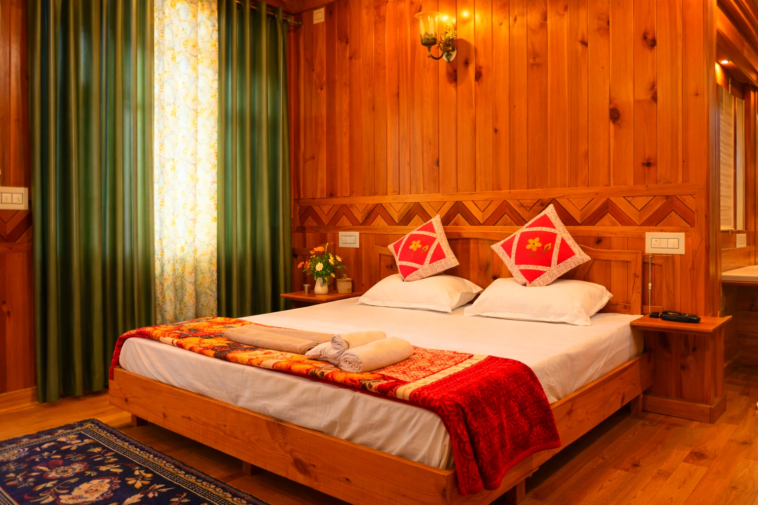 Comfortable bed with wooden interiors at The River Haven Homestay