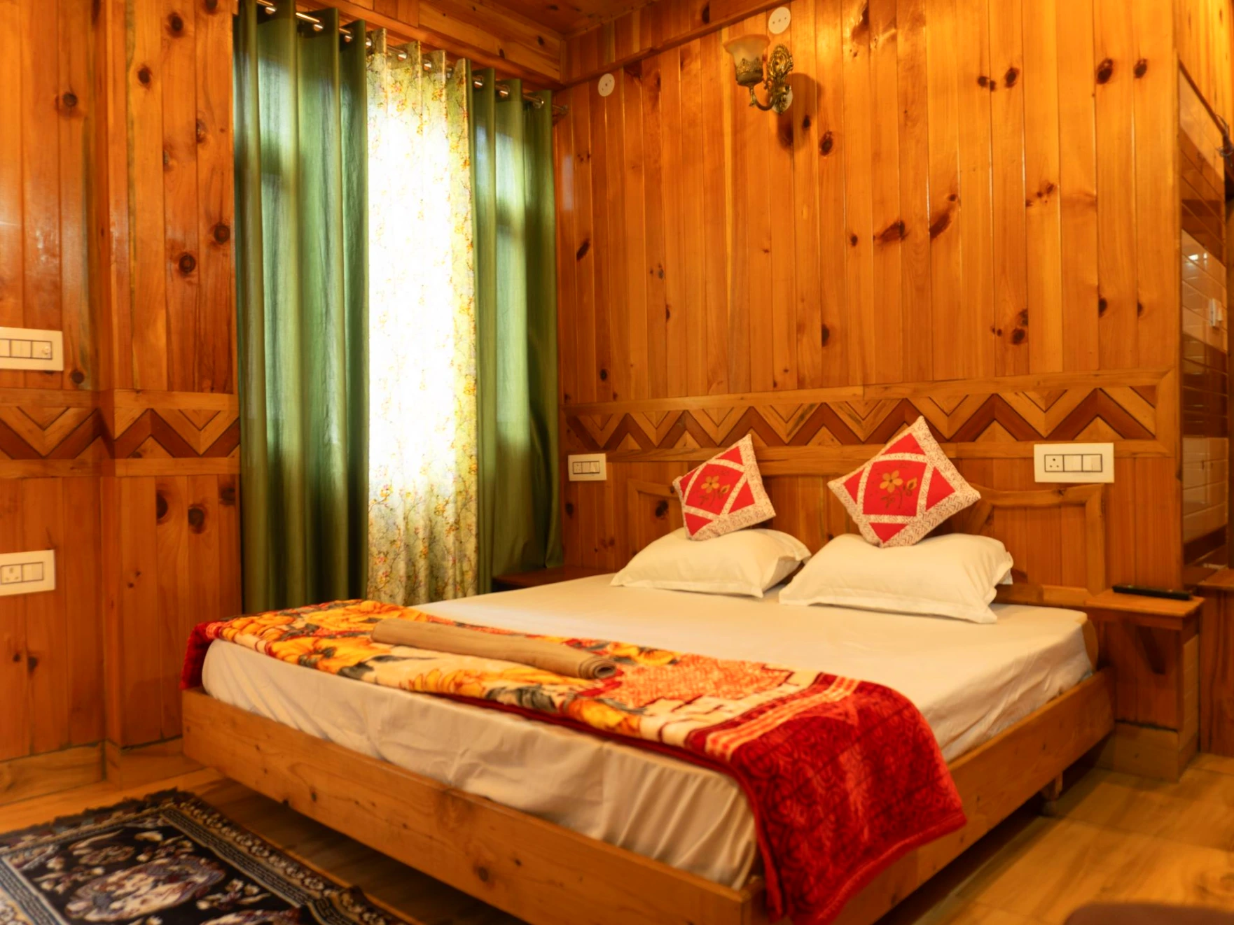 Comfortable bed with wooden interiors at The River Haven Homestay