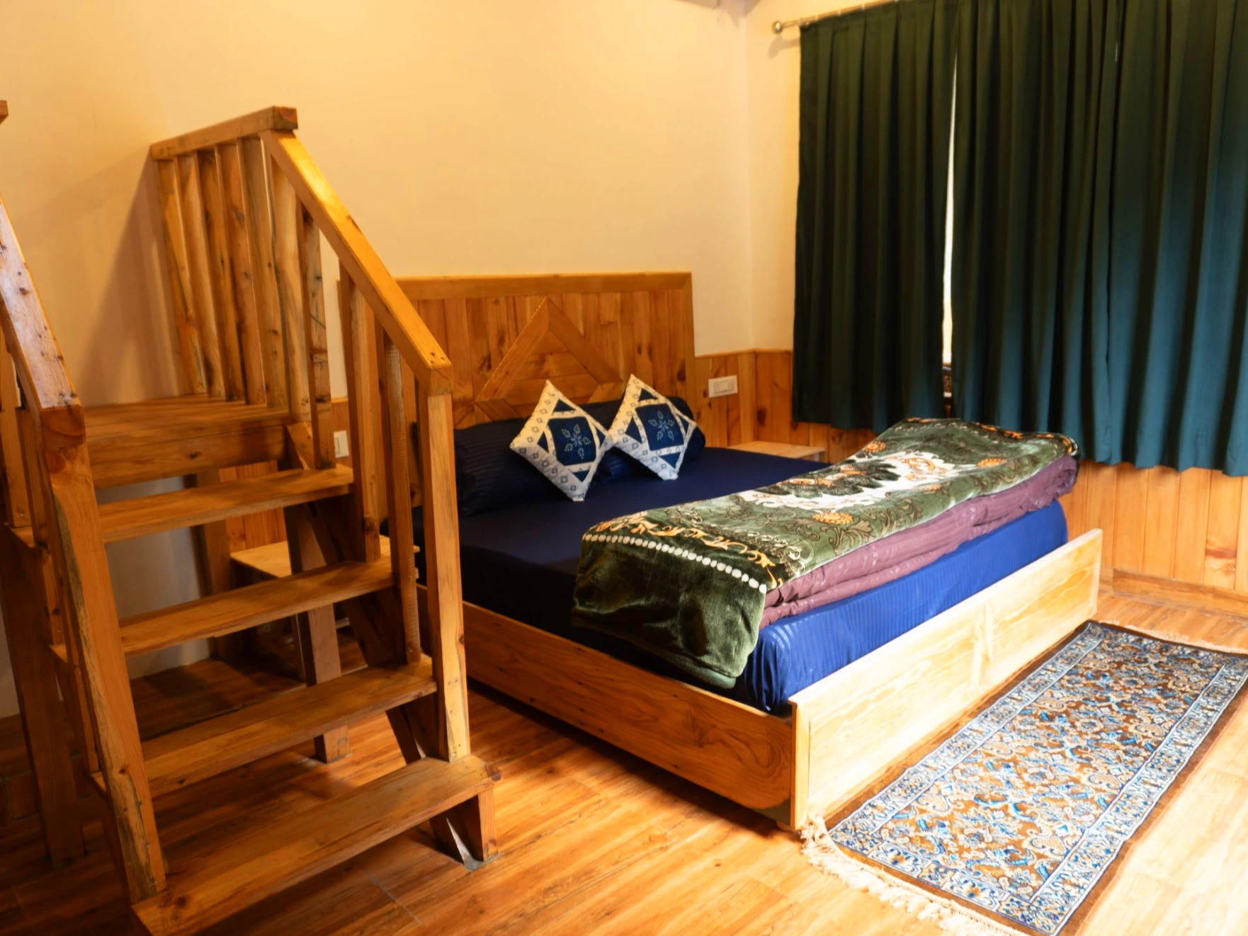Comfortable bed with wooden interiors at The River Haven Homestay