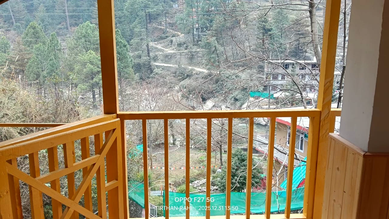 Balcony view surrounded by nature at The River Haven Homestay, Tirthan Valley
