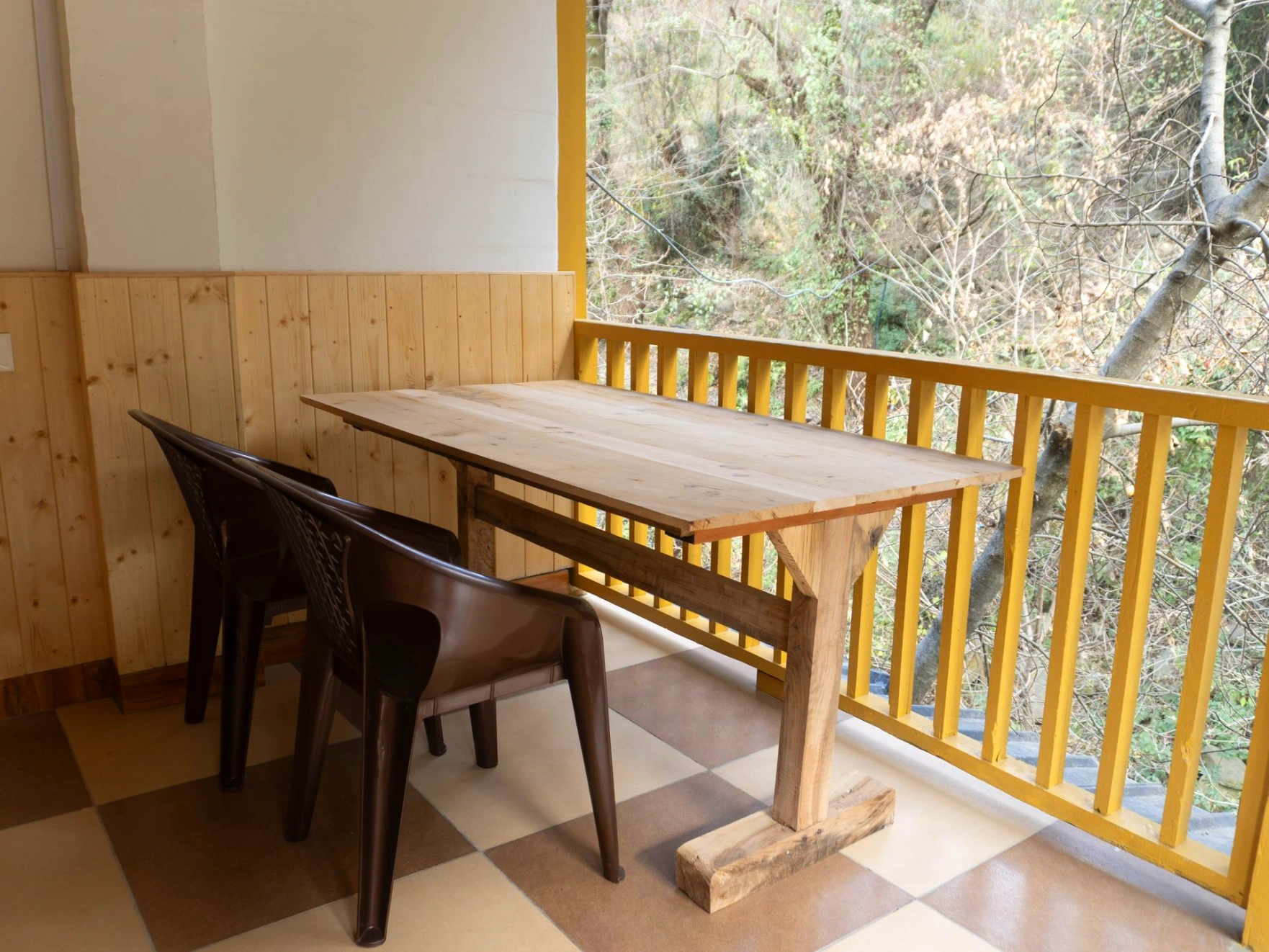 Balcony view surrounded by nature at The River Haven Homestay, Tirthan Valley