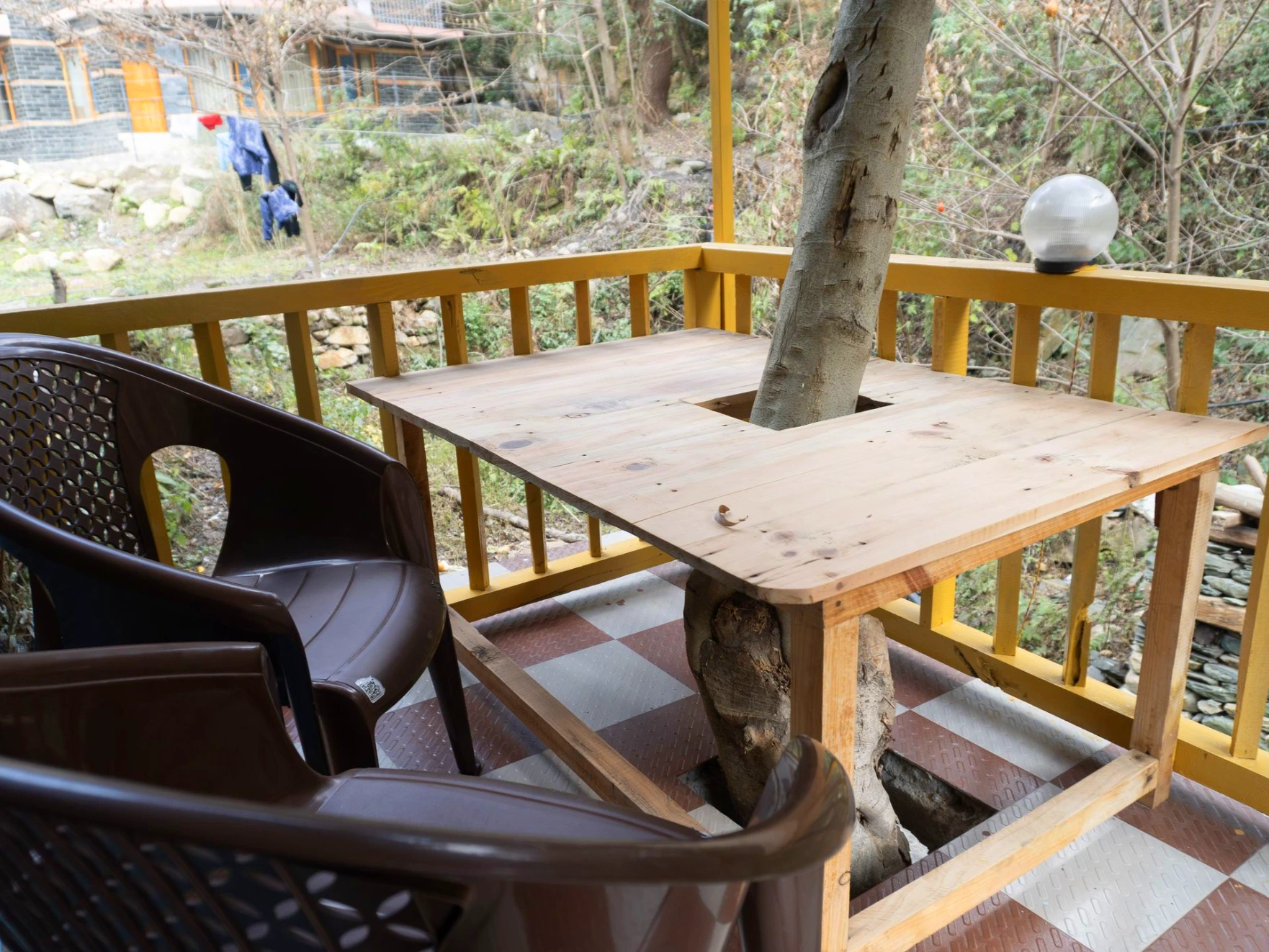 Balcony view surrounded by nature at The River Haven Homestay, Tirthan Valley